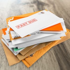 A stack of past due bills.