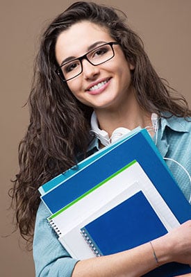 smiling-female-college-student-holding-books